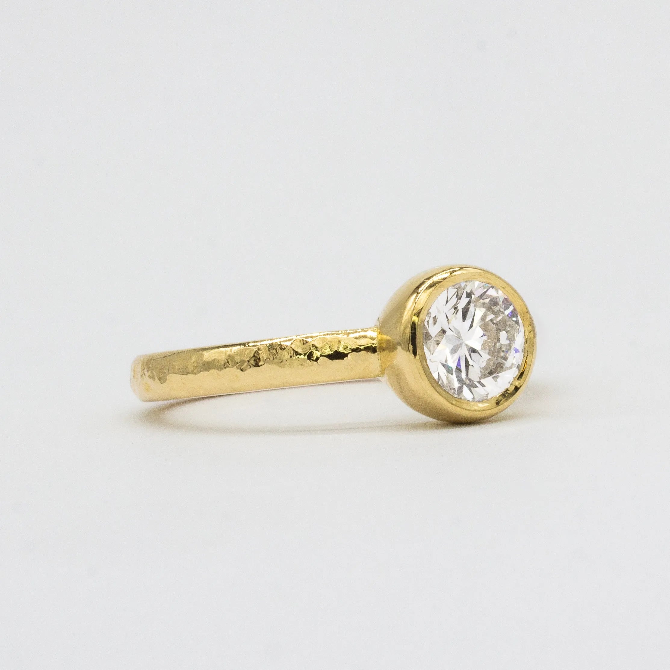 Solitaire Round Bezel Set Diamond Engagement Ring with Textured Band