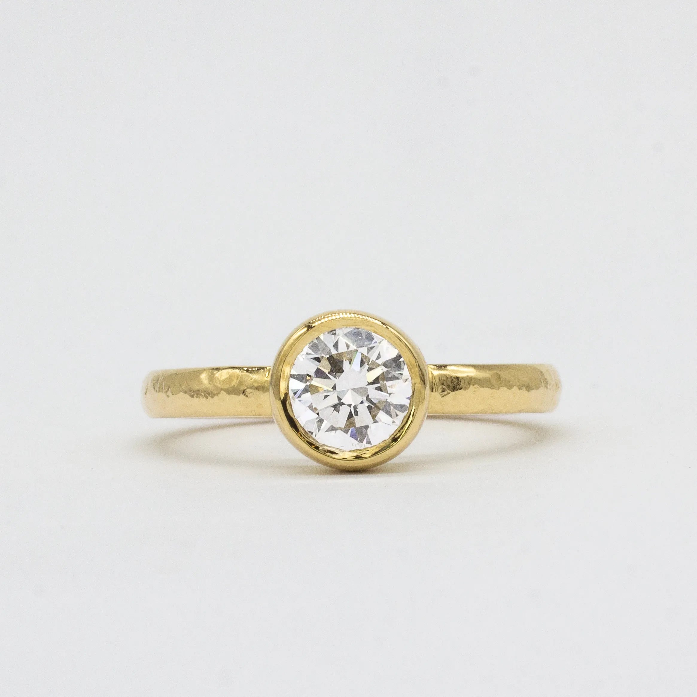 Solitaire Round Bezel Set Diamond Engagement Ring with Textured Band