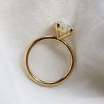 side angle of oval lab grown diamond engagement ring