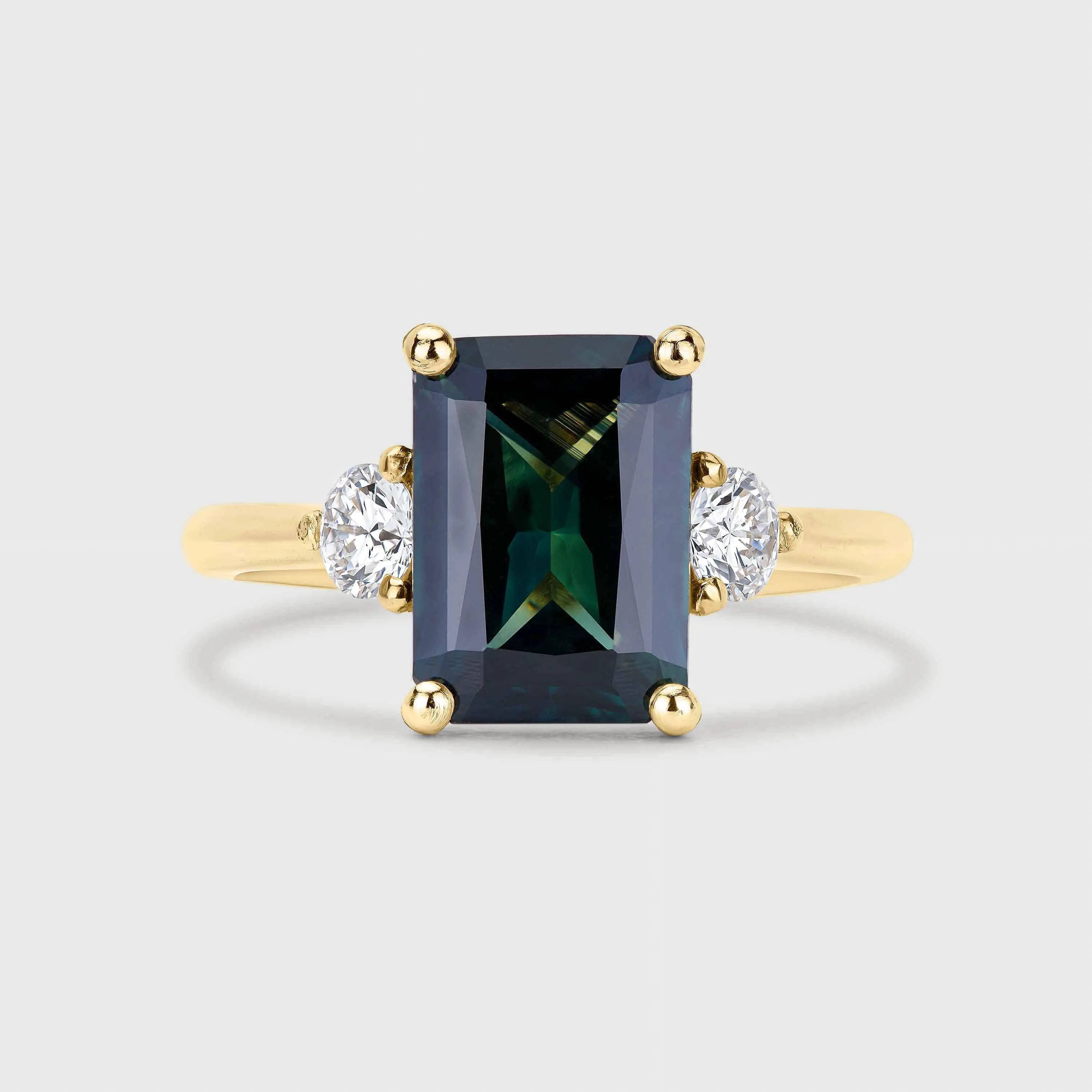 Statement Emerald Cut Green Sapphire Engagement Ring with Diamonds
