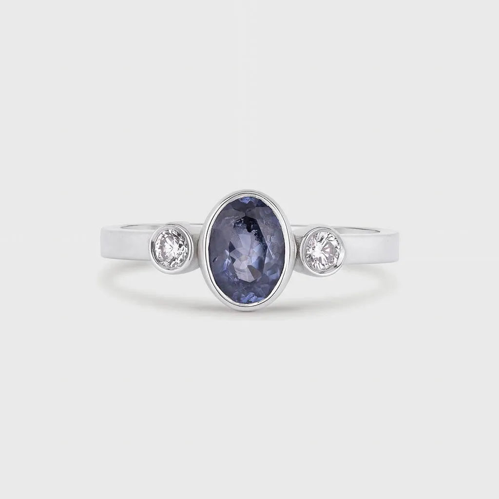 White Gold Bezel Set Blue Sapphire Engagement Ring with Round Diamonds