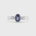 White Gold Bezel Set Blue Sapphire Engagement Ring with Round Diamonds