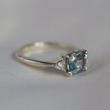 White Gold East-West Blue Emerald Cut Sapphire Engagement Ring
