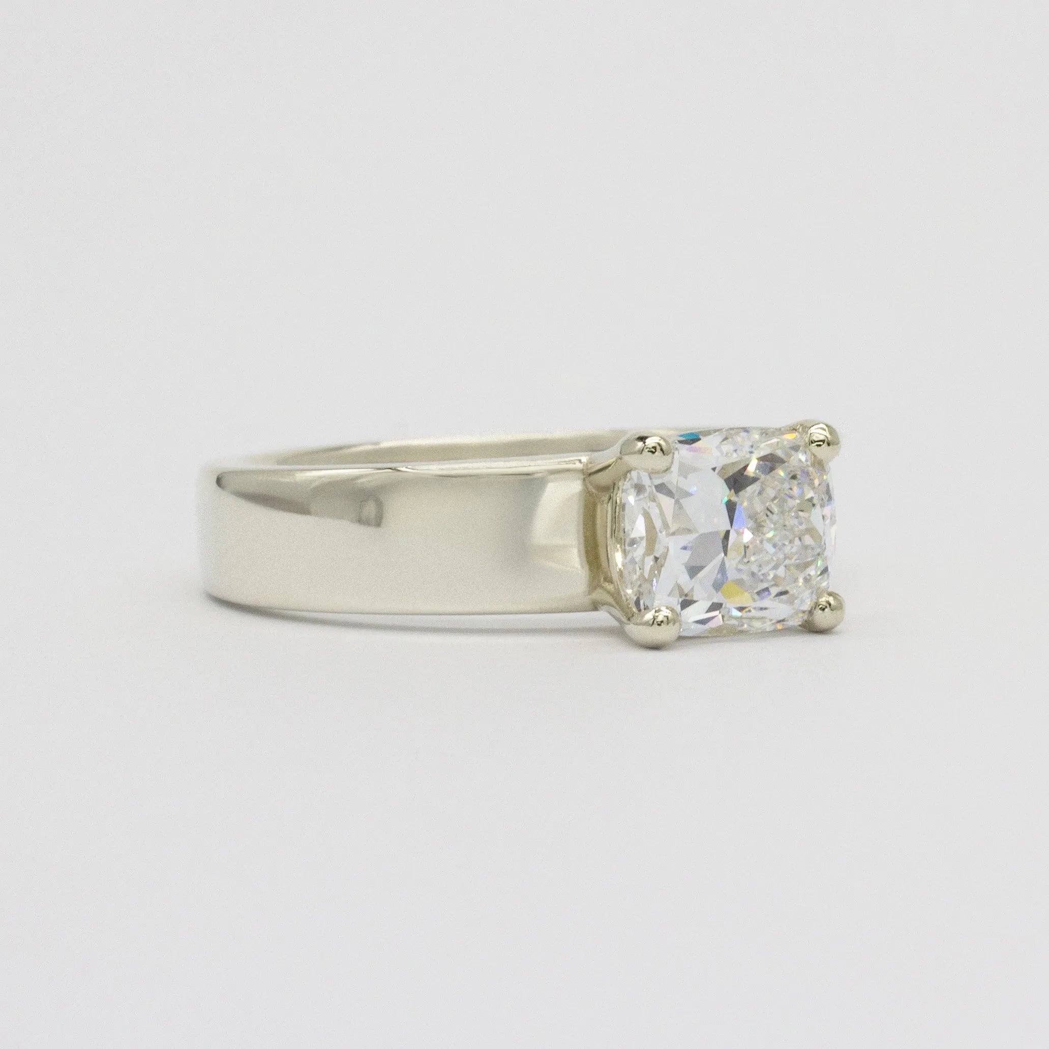Wide Band Engagement Ring with Cushion Cut Diamond