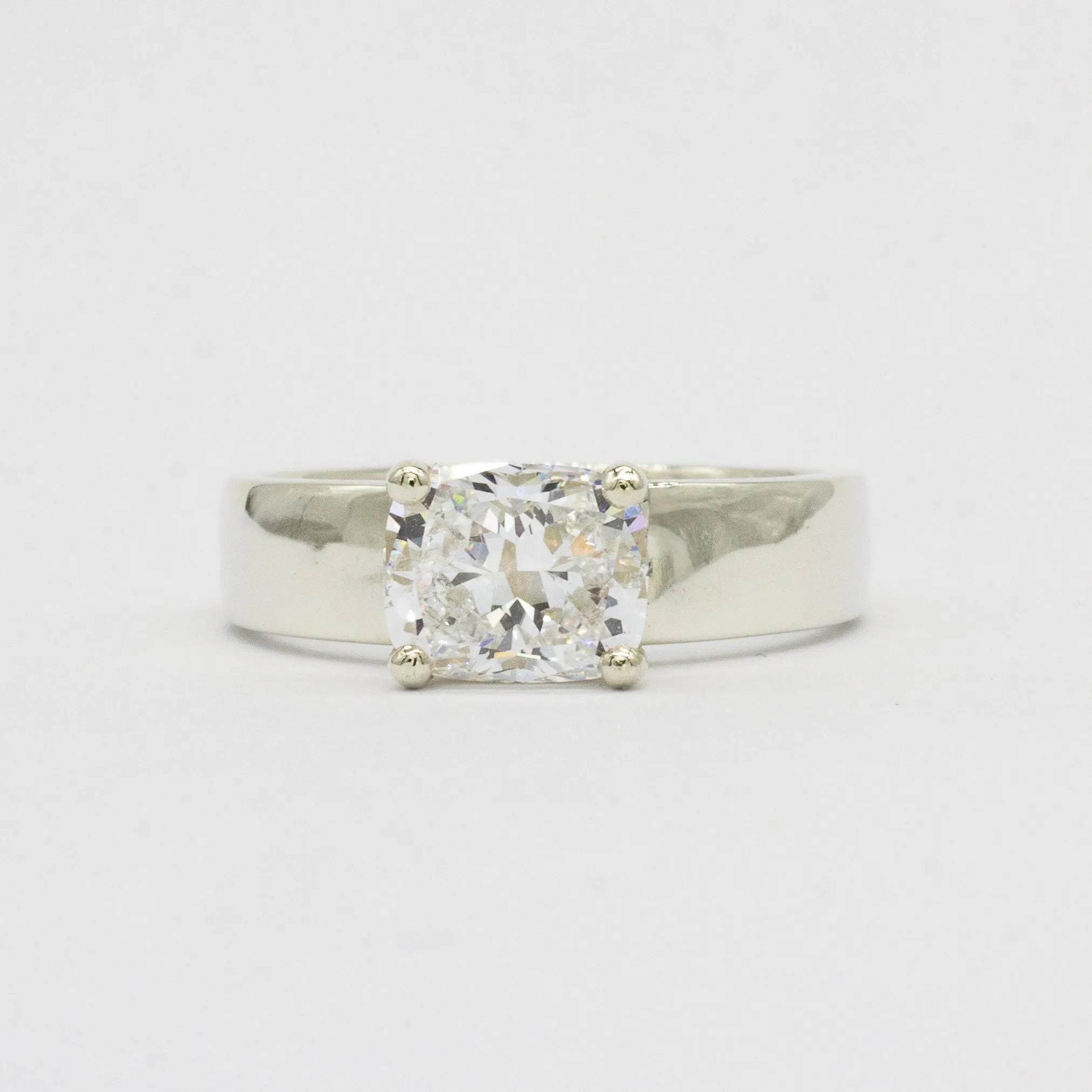 Wide Band Engagement Ring with Cushion Cut Diamond
