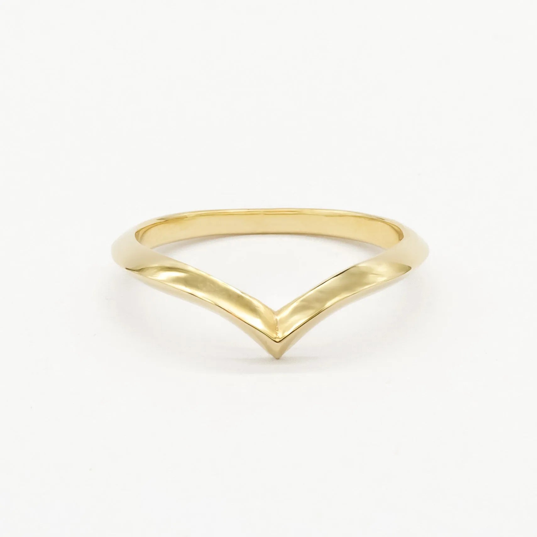 2mm gold chevron wedding ring with a V-shaped design on a white background