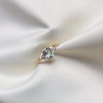 Light Blue Sapphire Engagement Ring With Cluster Diamonds