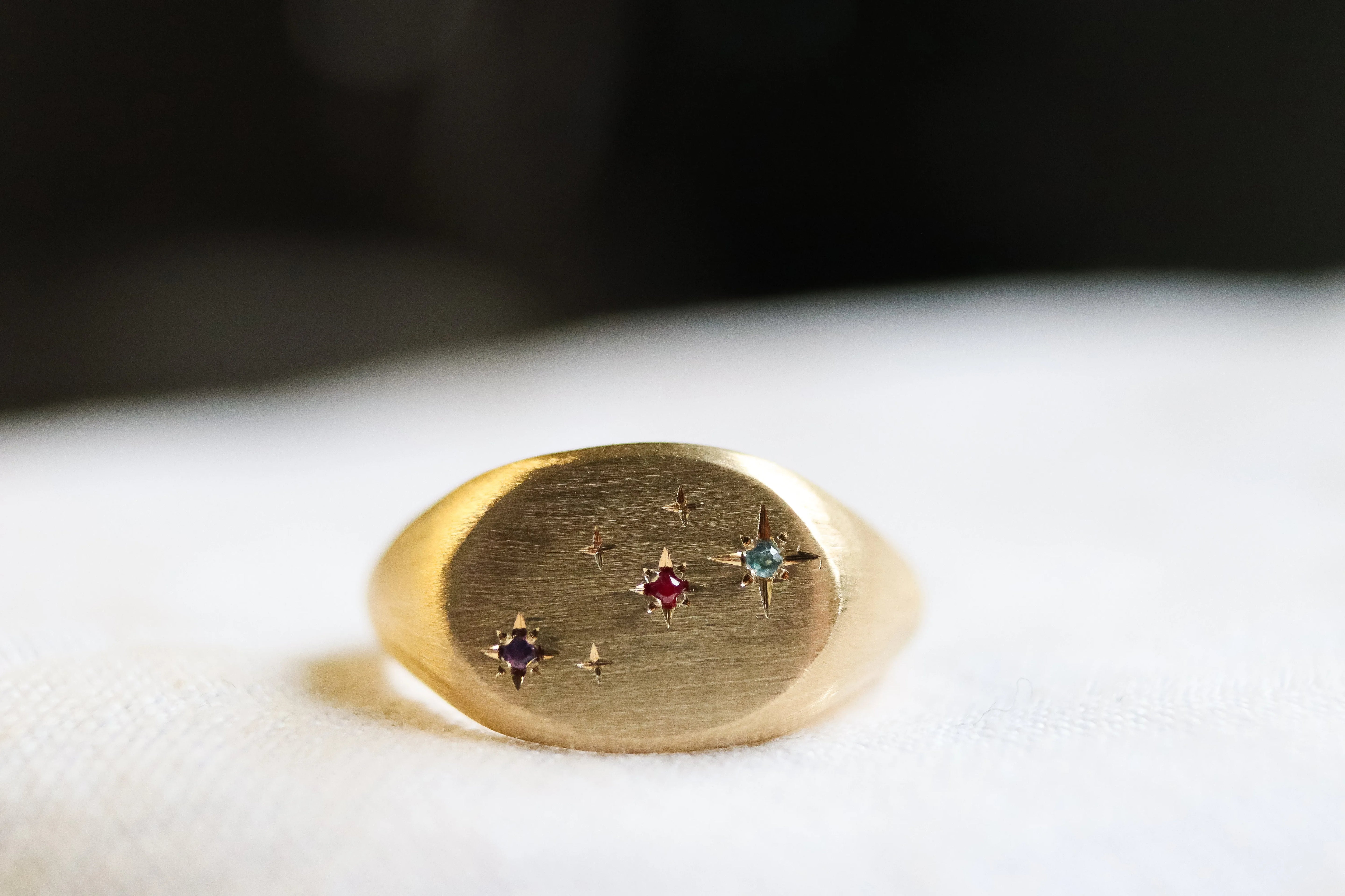 gold bespoke signet ring with stars and gemstones for mum and daughter jewellery ideas blog