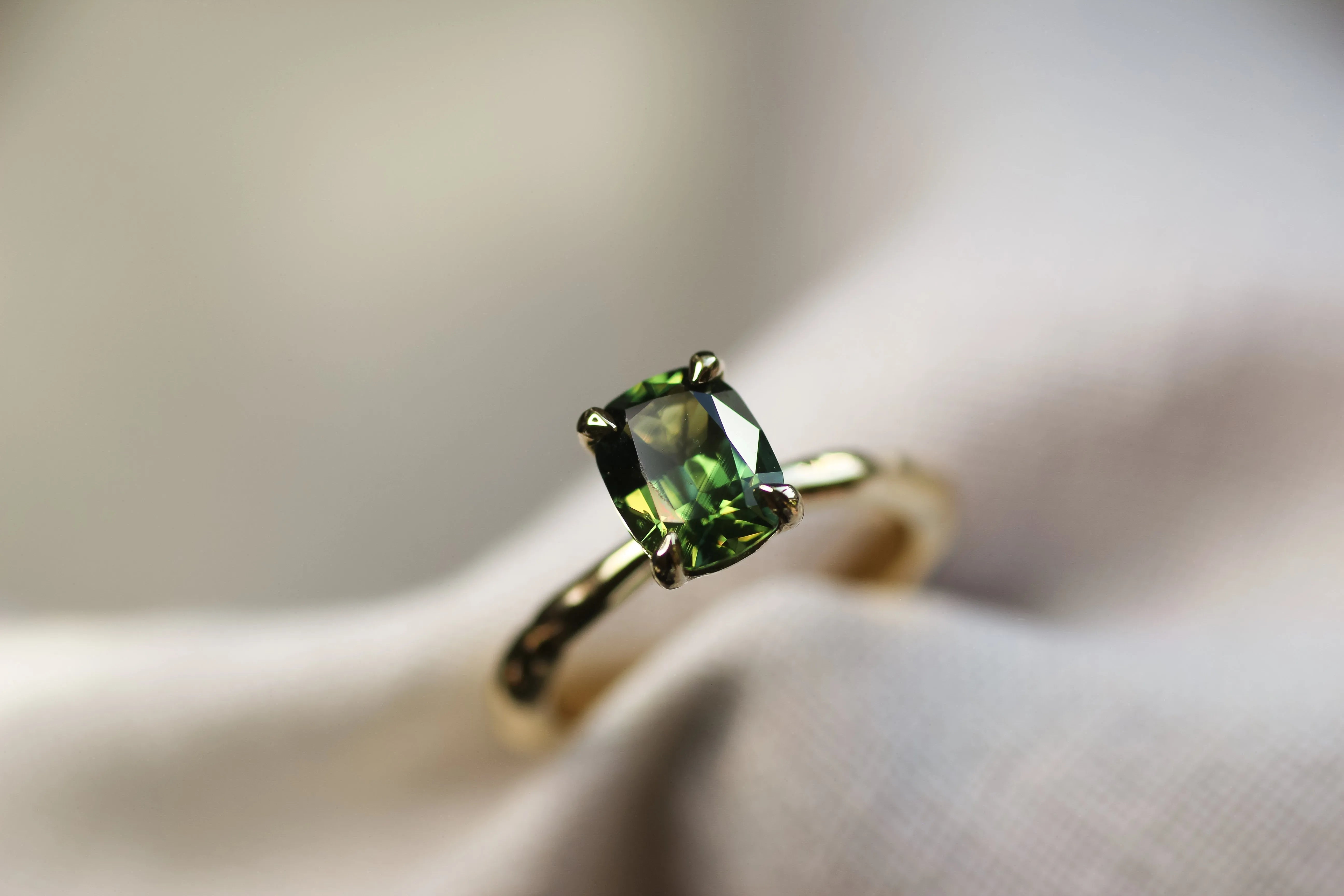 green sapphire cushion cut engagement ring