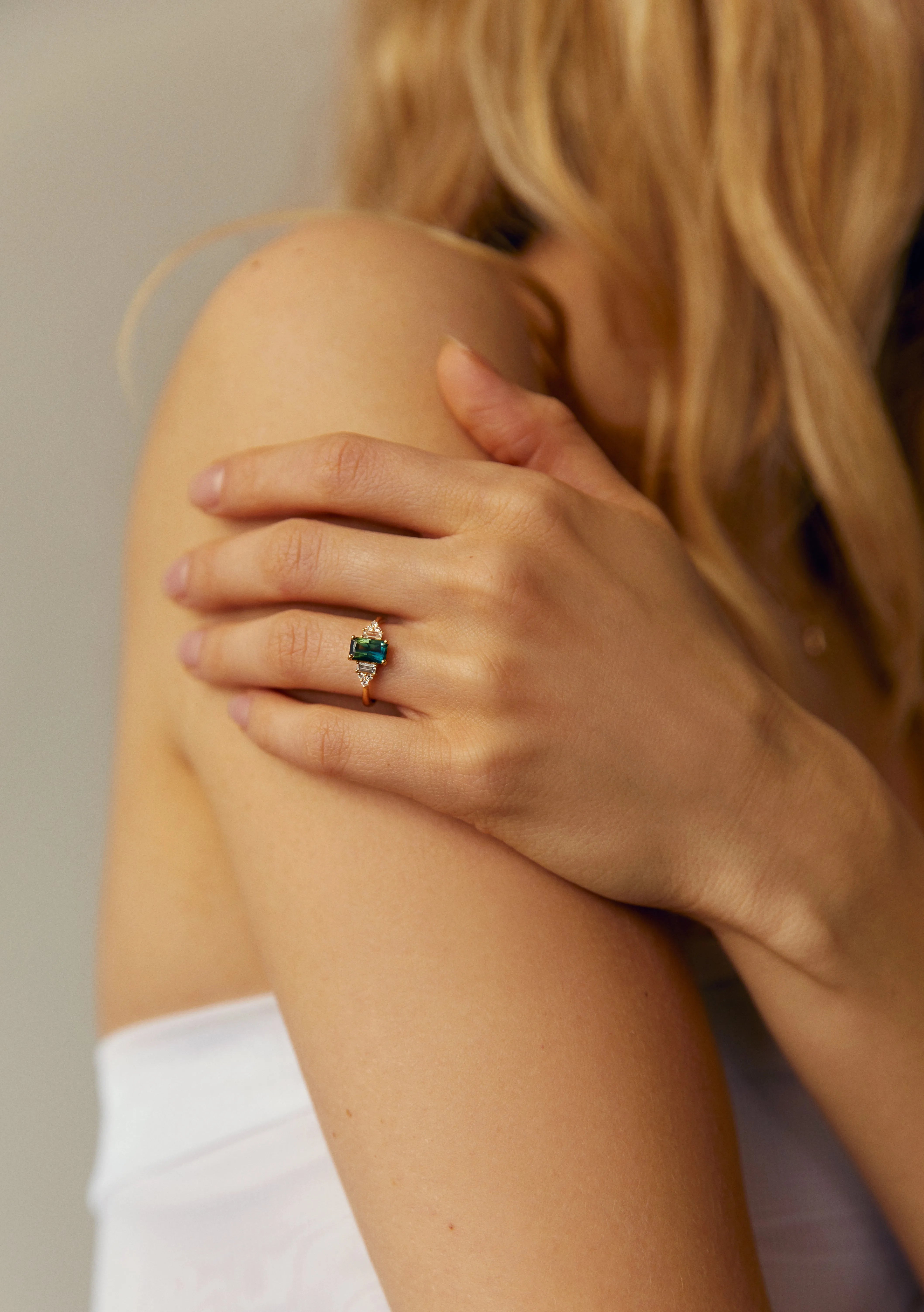 baguette engagement ring with sapphire and diamonds