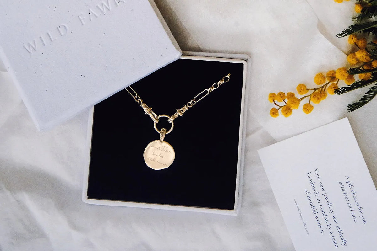gold handwriting necklace with flowers and Wild Fawn box