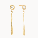 Gold earrings with round diamond studs and molten thin gold bars on a white background