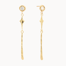 gold earrings with diamond stud, four-point star and molten gold bar detail on a white background