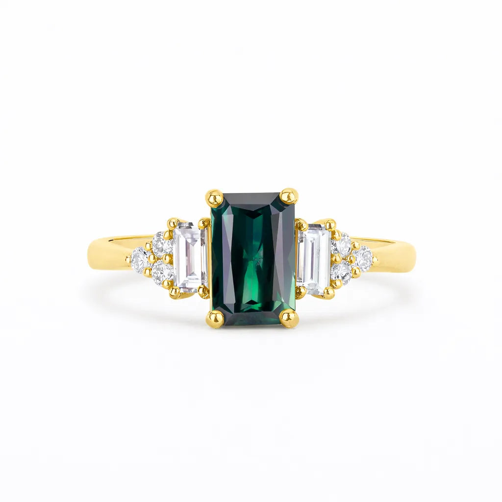 amazing Blue/Green Sapphire Baguette with Diamond Cluster Engagement Ring on a white background