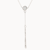white gold y-shaped necklace with round molten diamond pendant and molten bar hanging from a chain on a white background 