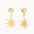 gold diamond dangle earrings with molten texture and sun-shaped charms on a white background