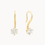 gold hook earrings with molten texture and round diamonds on a white background