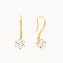 gold hook earrings with molten texture and round diamonds on a white background