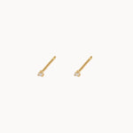 pair of 1.5mm diamond studs set in yellow gold