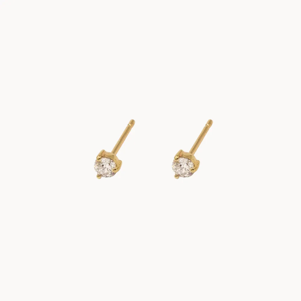 pair of 3mm diamond solitaire studs set in yellow gold