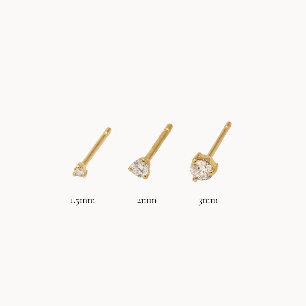 1.5mm, 2mm and 3mm diamond stud cut-outs in yellow gold with labels
