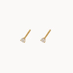 pair of diamond 2mm diamond stud earrings set in yellow gold