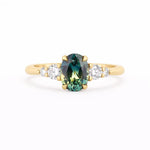5 Stone Wed-fit Green Sapphire Engagement Ring on a white background