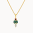 A gold pendant necklace featuring a blue/green emerald-cut sapphire, a pear diamond, and a small round pink gemstone on a delicate gold chain, set against a plain light background.