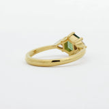 back view of hexgaon sapphire engagement ring with low setting on white background