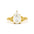 gold engagement ring with leaf detail on band and large pear diamond on a white background