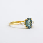 Blue Oval Sapphire Engagement Ring with Pear Accent Diamonds
