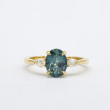 Blue Oval Sapphire Engagement Ring with Pear Accent Diamonds