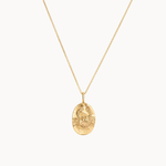 Gold cancer crab necklace with an oval pendant on a white background