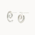 Silver spiral earrings on a white background