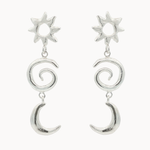 Silver earrings with sun, spiral, and crescent moon designs on a white background