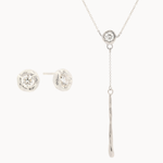 white gold jewelry set with diamond stud earrings and a y-shaped diamond molten necklace on a white background