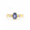 Gold ring with a blue gemstone and two smaller diamonds on a white background