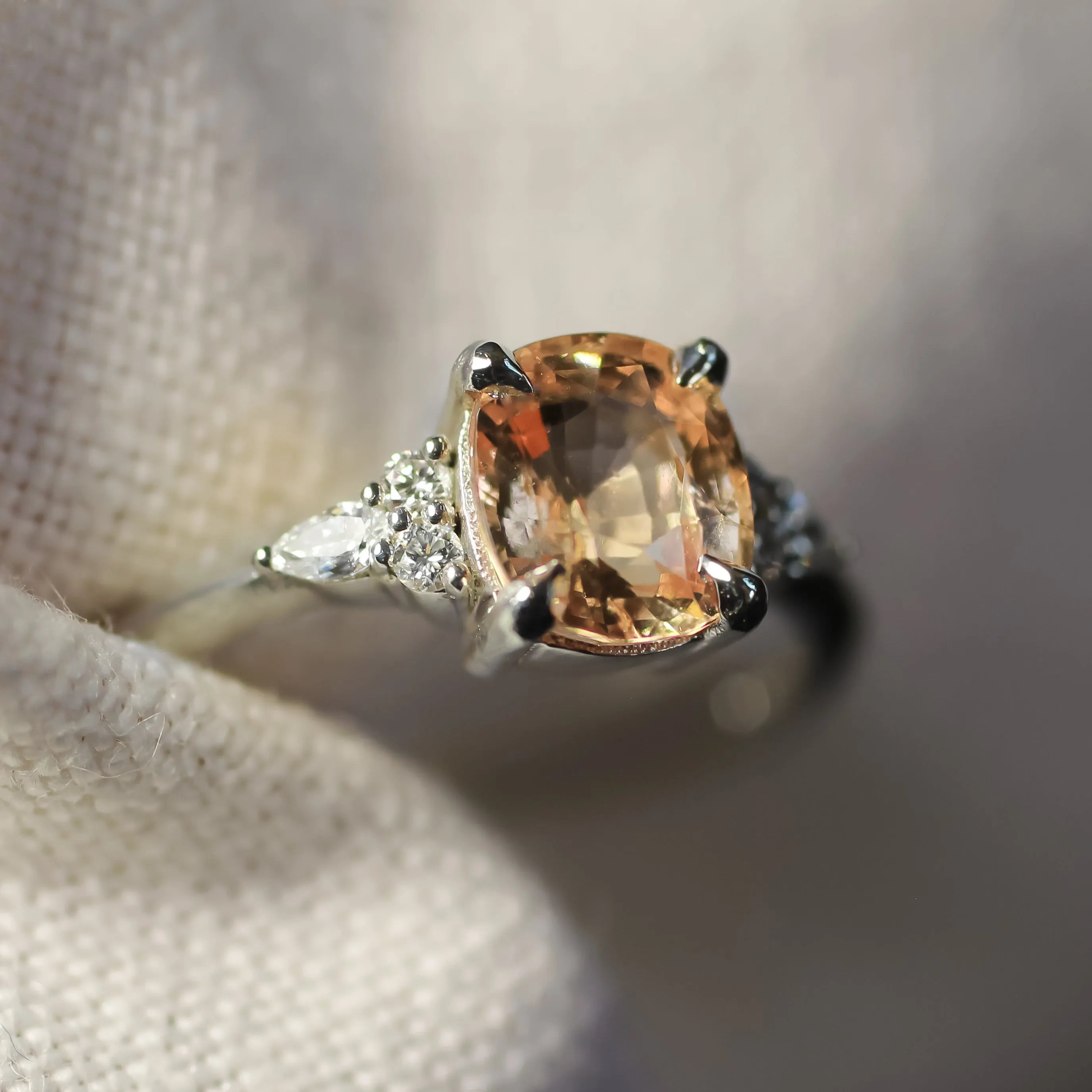 Cushion Cut Peachy Orange Sapphire Engagement Ring with Diamonds-Engagement Rings-Wild Fawn Jewellery