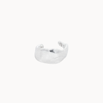 Silver leaf shaped ear cuff on a white background
