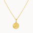 Gold necklace with a round moonlight pendant on a white background