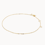 Gold bracelet on a white background