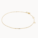 Gold bracelet on a white background
