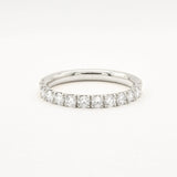 white gold diamond 2.3mm wide eternity wedding ring on a white background