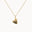Gold heart-shaped pendant necklace with 'A&L' engraving on a white background