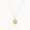 Gold leo necklace with an oval pendant on a white background