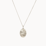 Silver leo necklace with an oval lion pendant on a white background
