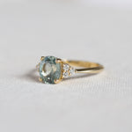 Light Blue Sapphire Engagement Ring With Cluster Diamonds