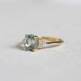 Light Blue Sapphire Engagement Ring With Cluster Diamonds