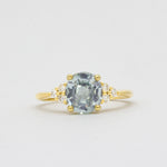 Light Blue Sapphire Engagement Ring With Cluster Diamonds