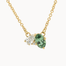 A gold chain necklace with an greeny blue sapphire pendant alongside a marquise-cut diamond, shown on a plain white background.
